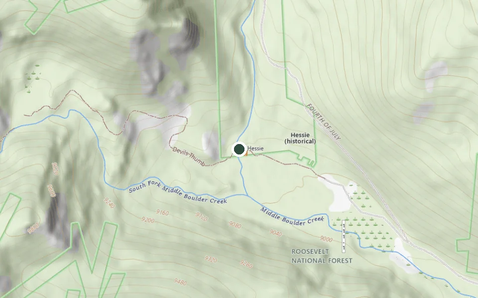 USGS topographic map of the Hessie Trailhead west of Nederland, with the trailhead marked beside Middle Boulder Creek and the Devils Thumb trail visible.
